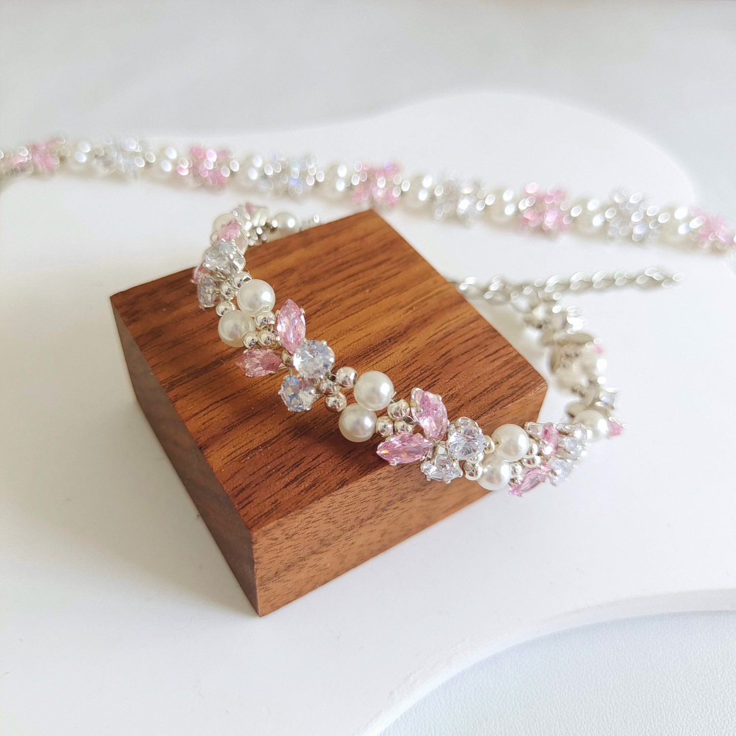 Romantic CZ bracelet with pink and transparent stones in silver setting