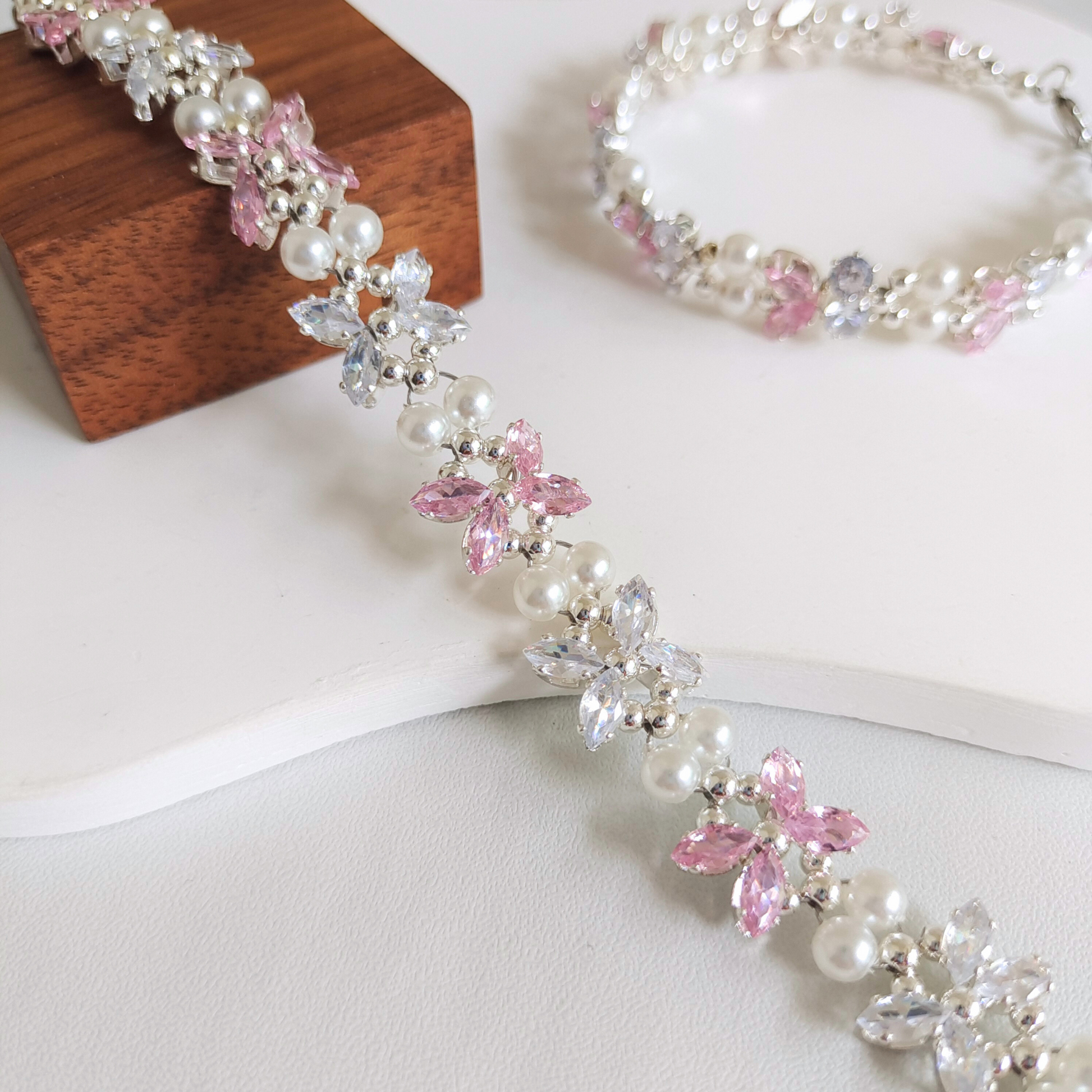 Detailed view of sparkling pink and transparent zircon stone bracelet