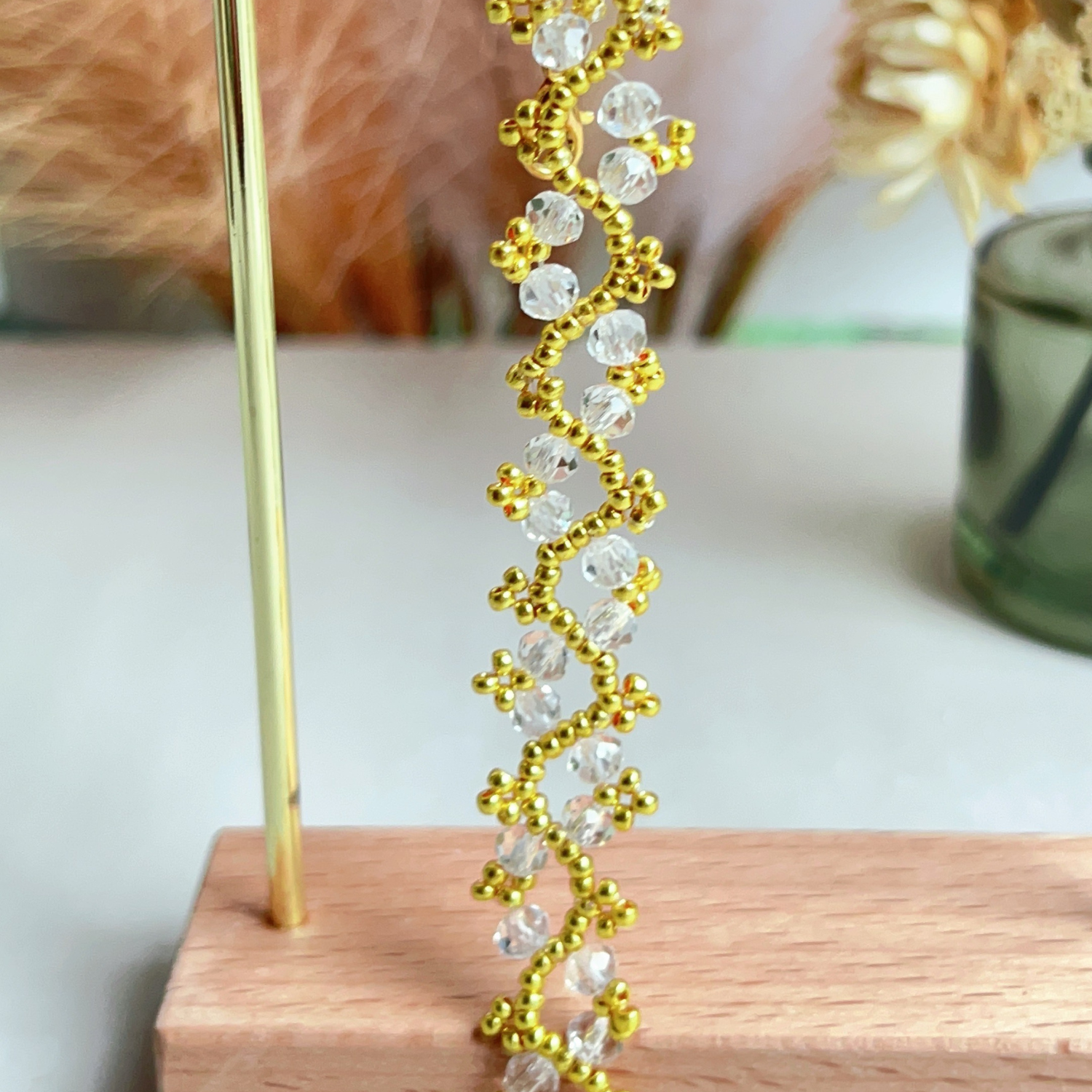 Minimalist bracelet with clear flat wheel beads – close-up product image for detail view
