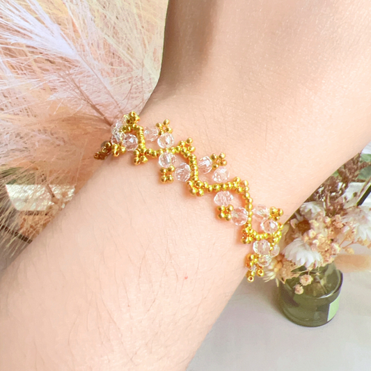 Model wearing a transparent flat bead bracelet