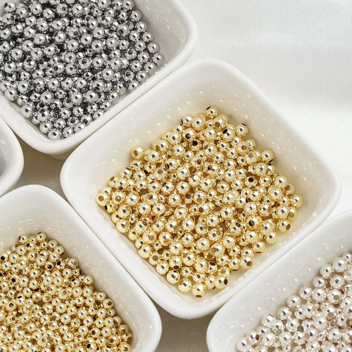 Three colors options of shiny silver seed beads for bracelets and necklaces