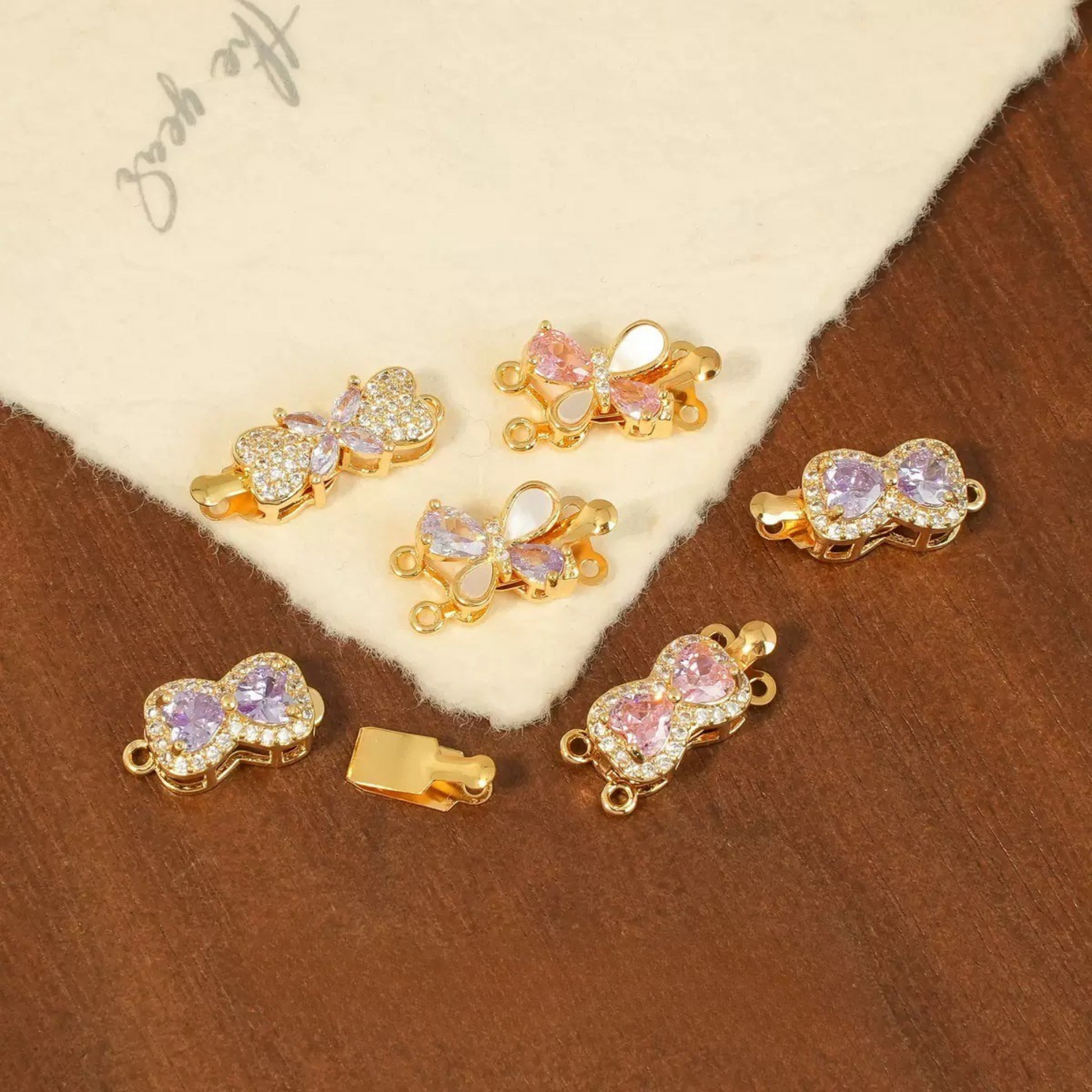 Gold-plated butterfly insert clasp with shiny zircon