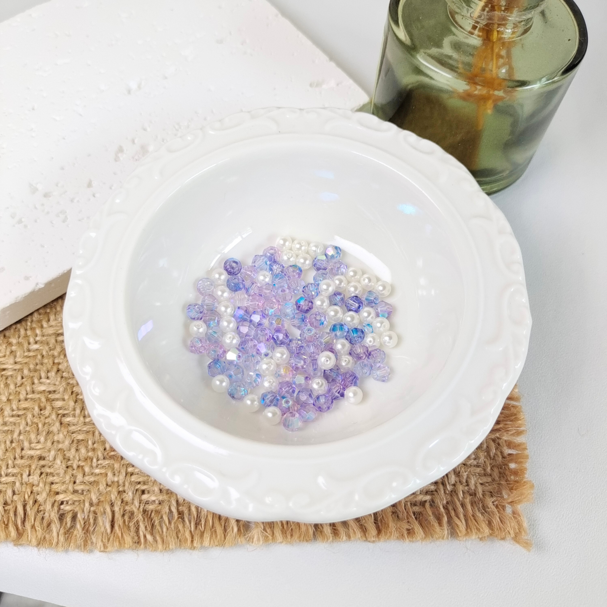 Bracelet materials: iridescent purple beads and pearls