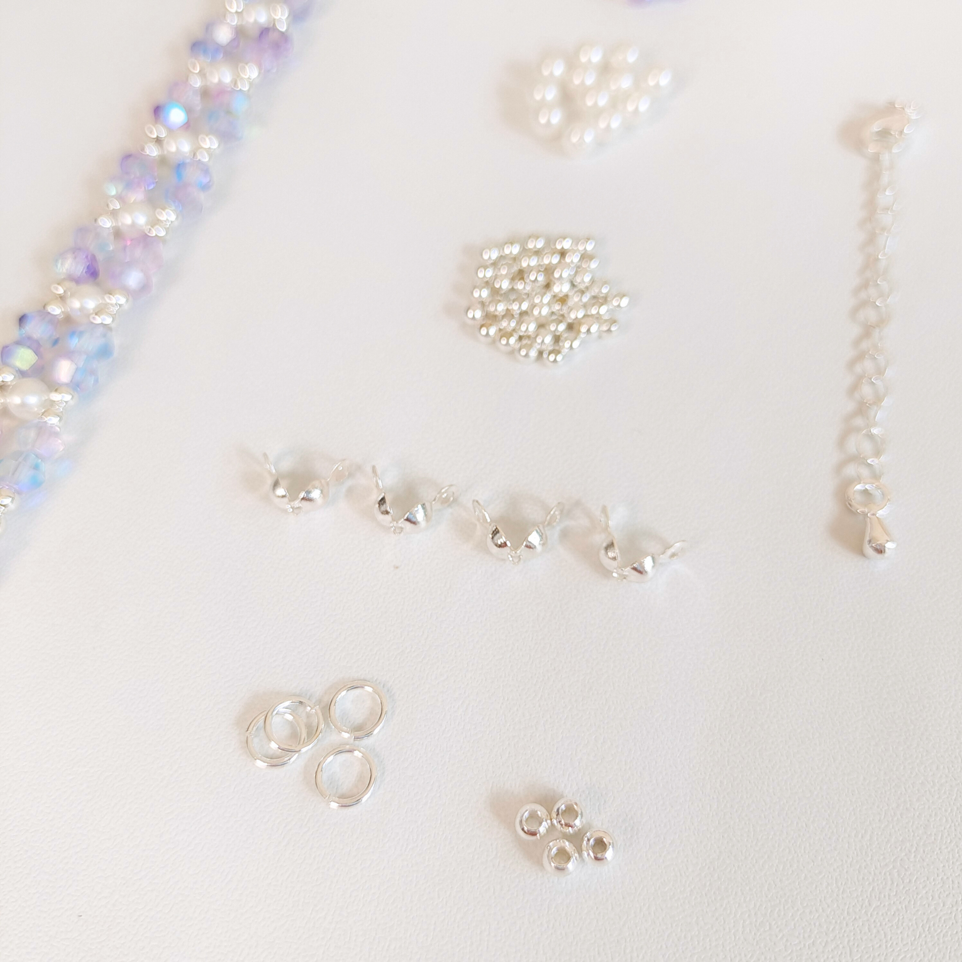 Jewelry-making supplies: aurora purple crystals and findings