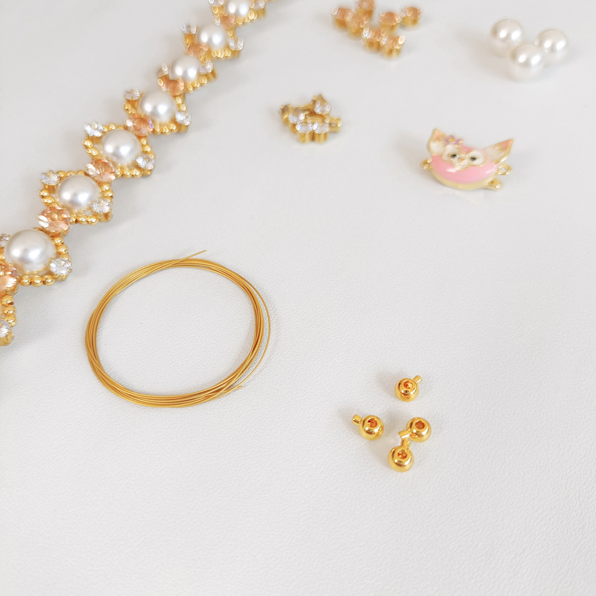 Handmade bracelet supplies featuring LinaBell connector and pearls
