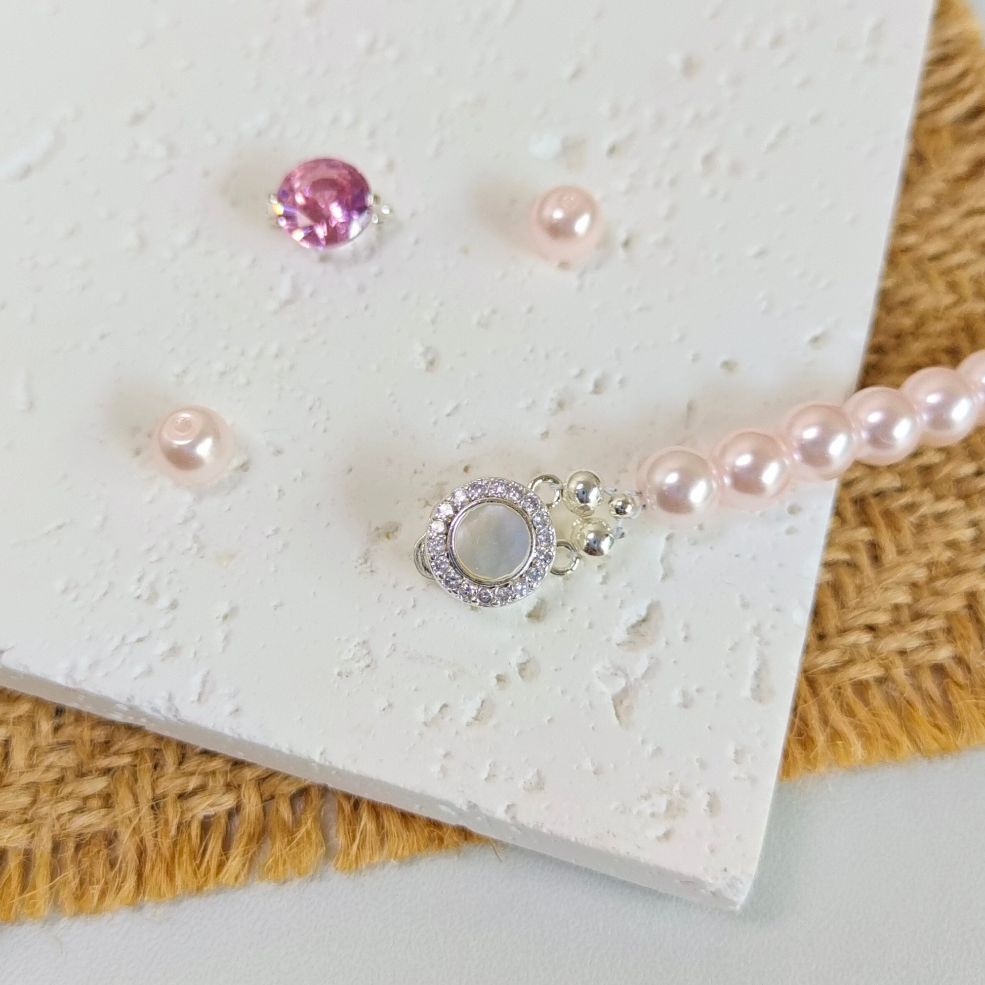 Close-up of the back side of double-row jewelry clasp
