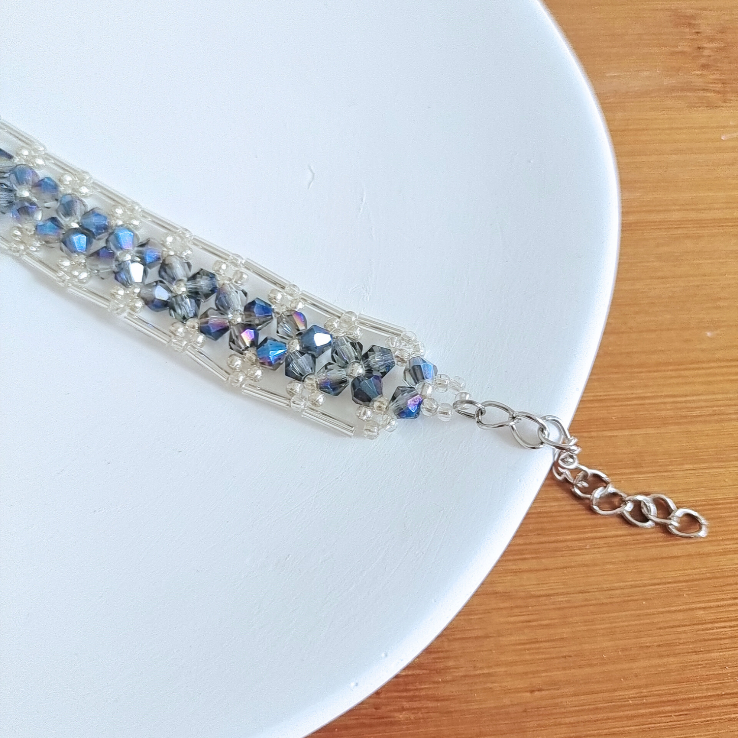 Detail shot of blue-grey diamond bead bracelet