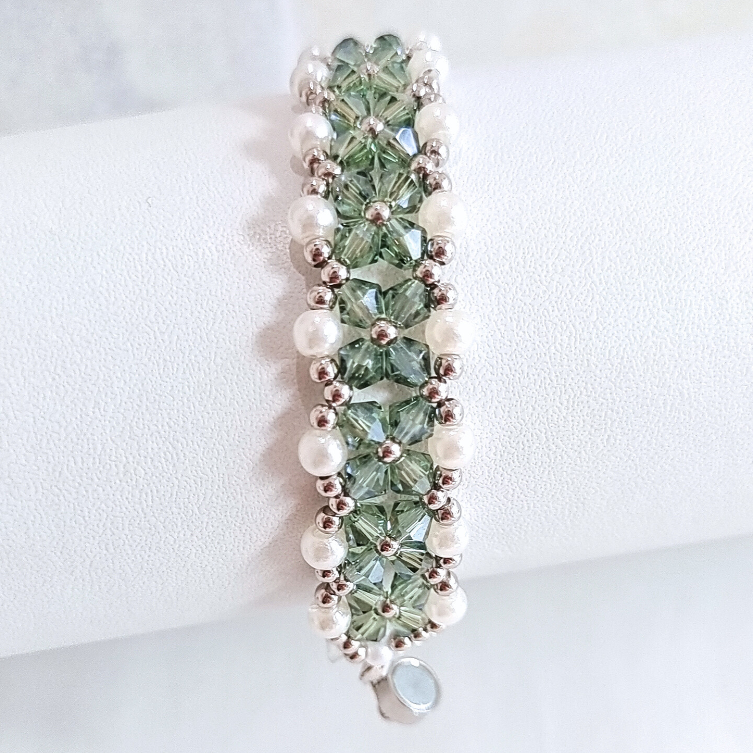 Close-up of gray-green diamond beads bracelet