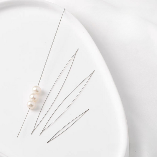 Three beading needle sizes displayed