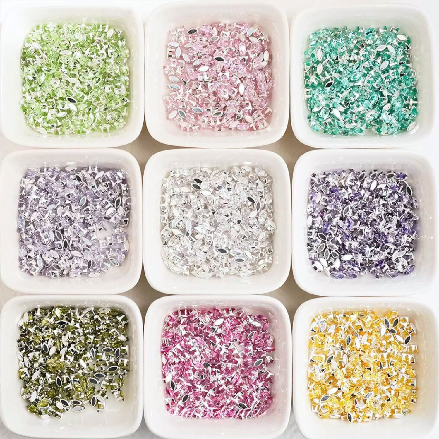 Marquise-cut cubic zirconia stones in silver-plated claw settings