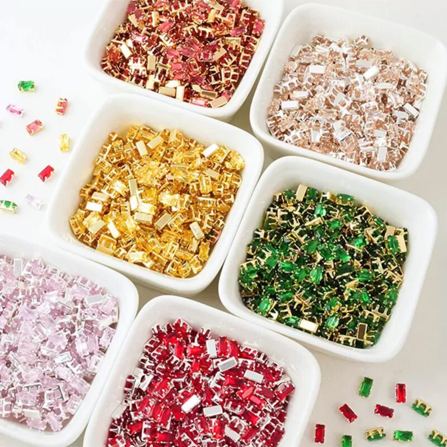 Multi-colored rectangular zirconia gemstones with claw settings