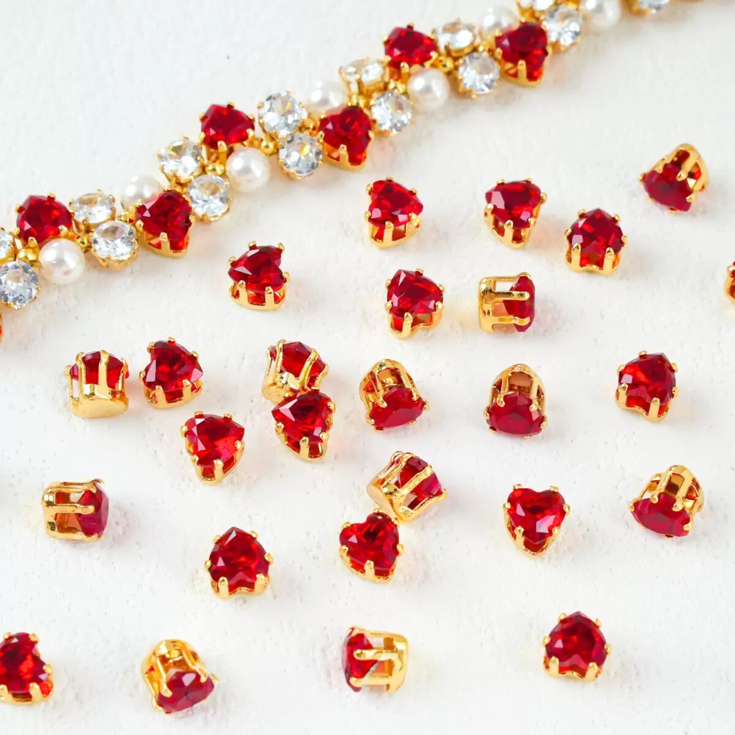 Heart-shaped cubic zirconia in gold-plated claw setting