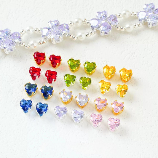 Heart-shaped cubic zirconia stones in claw settings