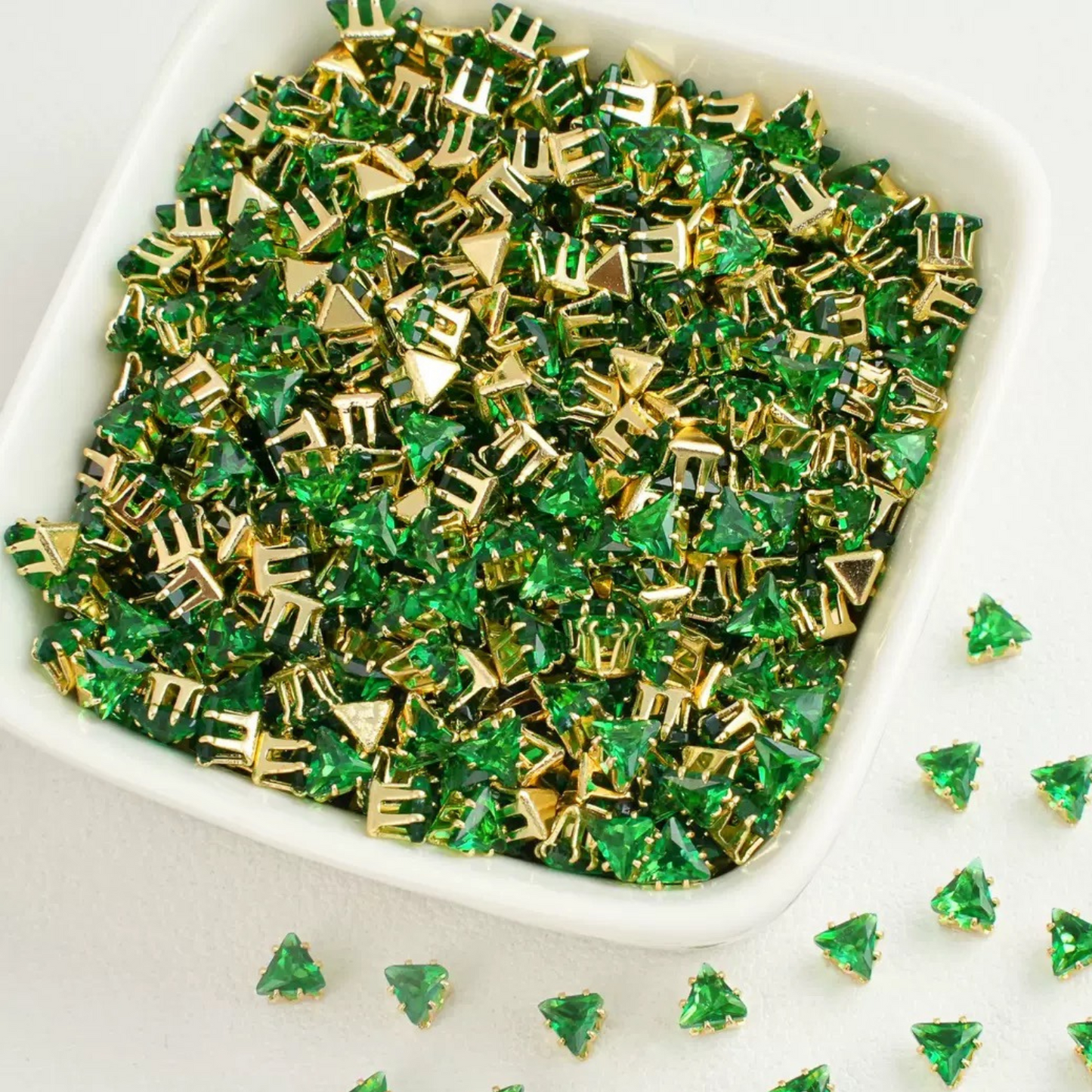 Triangle-shaped green zircon beads with gold base