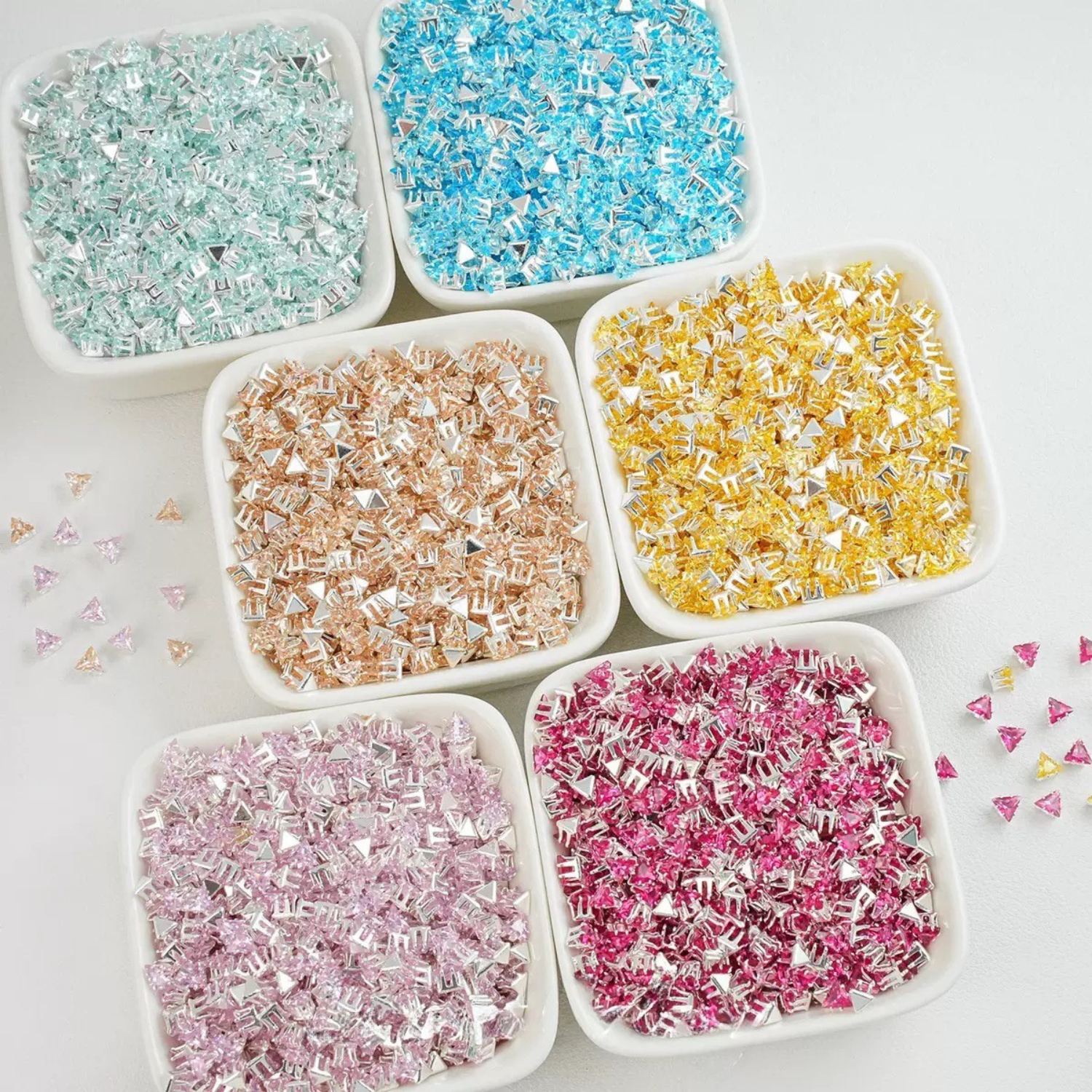Triangle-shaped zircon beads with silver base