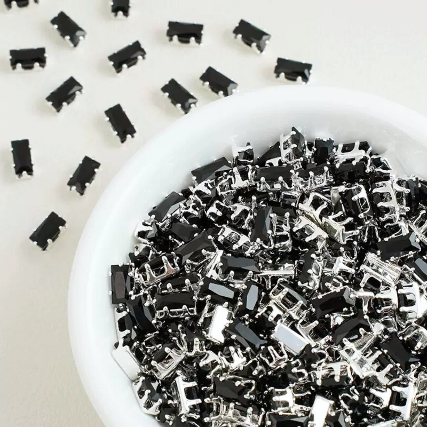 Rectangular cubic zirconia gems in black