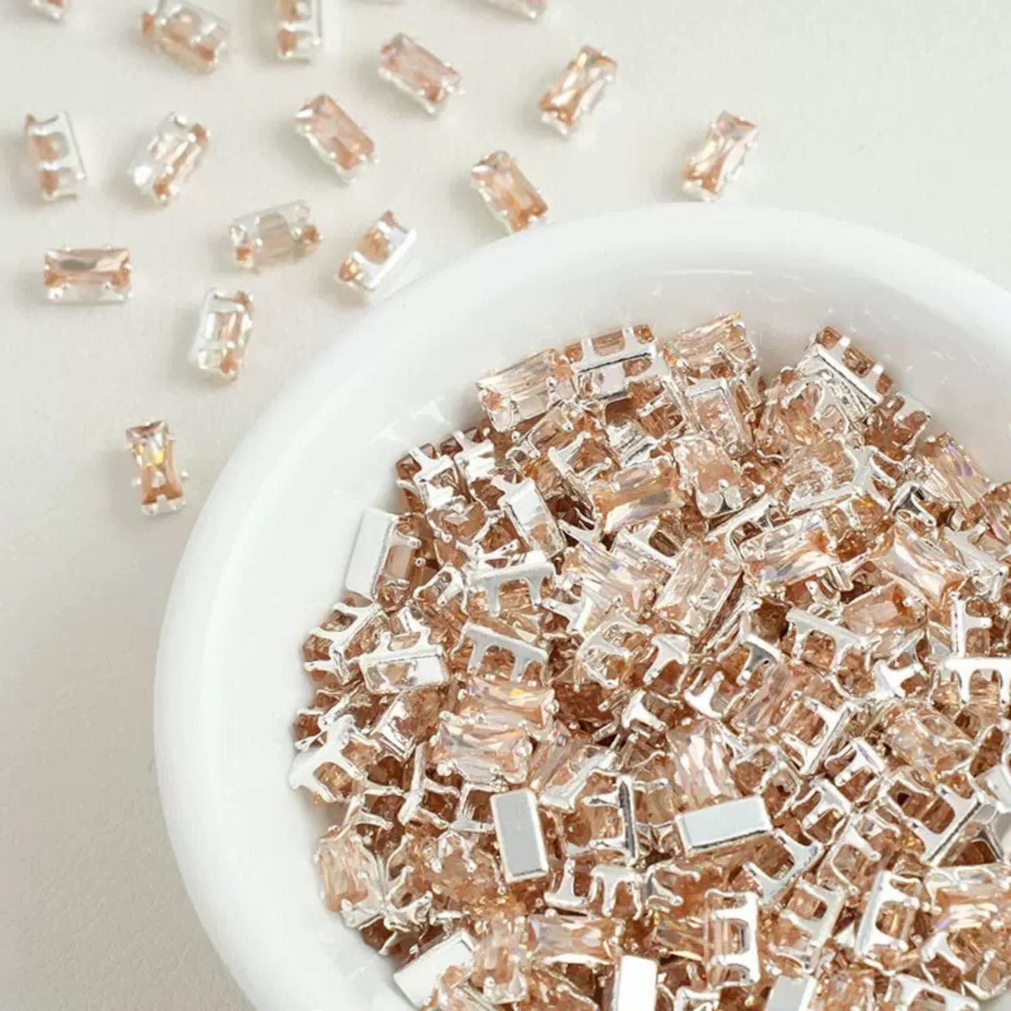Rectangular cubic zirconia gems in champagne
